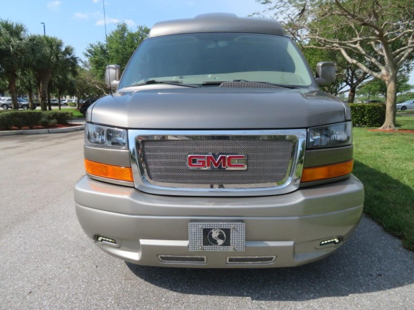 2013 /Beige Two Tone GMC Savana RV G1500 3LT (1GDS7DC45D1) with an 5.3L V8 OHV 16V engine, 4-Speed Automatic transmission, located at 4301 Oak Circle #19, Boca Raton, FL, 33431, (954) 561-2499, 26.388861, -80.084038 - You are looking at a Gorgeous 2013 GMC Savana 1500 High Top Conversion Van Explorer Limited SE Package Handicap Wheelchair Conversion Van with 72K Original Miles, Side Entry Braun Millennium Series Wheelchair Lift, Rubber Floor, Q-Straint Tie Down System, Navigation, Back Up Camera, Huge flat Screen - Photo#9